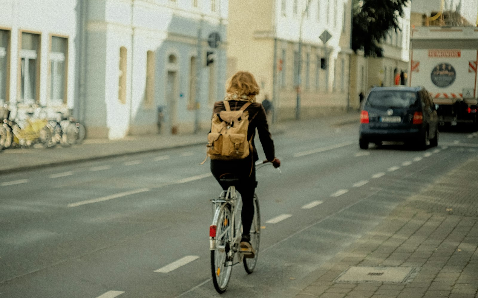 Cyclist riding in a city bike lane, illustrating myths a bicycle accident attorney in Rosedale hears after crashes