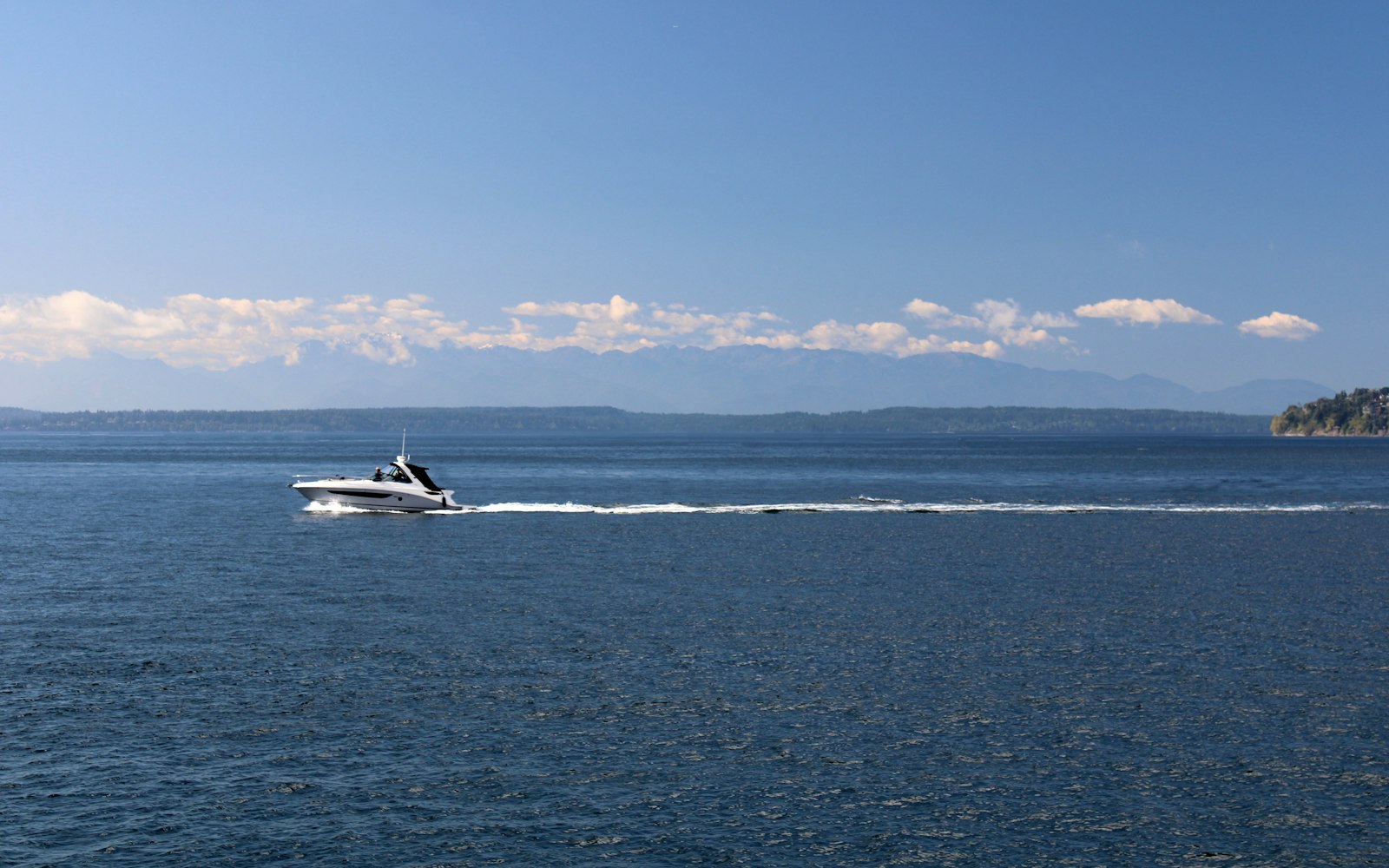 Motorboat speeding across open water, the kind of scene a boating accident lawyer investigates after a crash