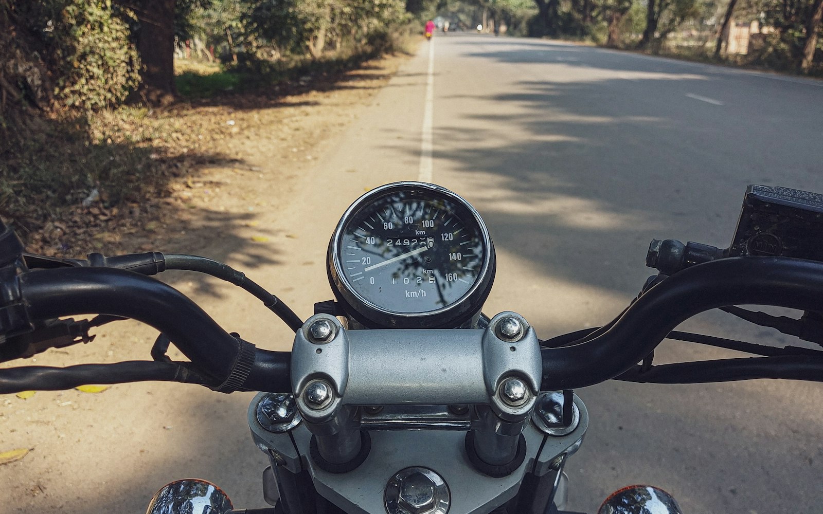 Motorcycle rider on an open highway, representing the riders a motorcycle accident lawyer in Rosedale represents