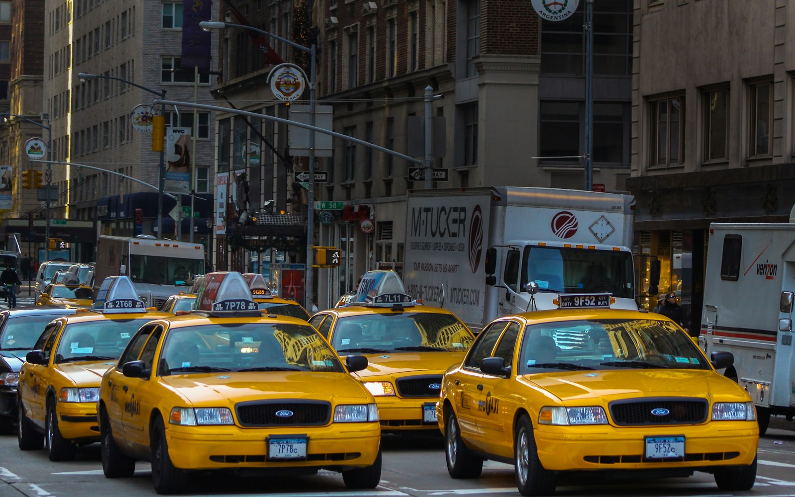 Yellow taxi at an airport curb, illustrating a taxi accident lawyer in Rosedale explaining cab crash claims