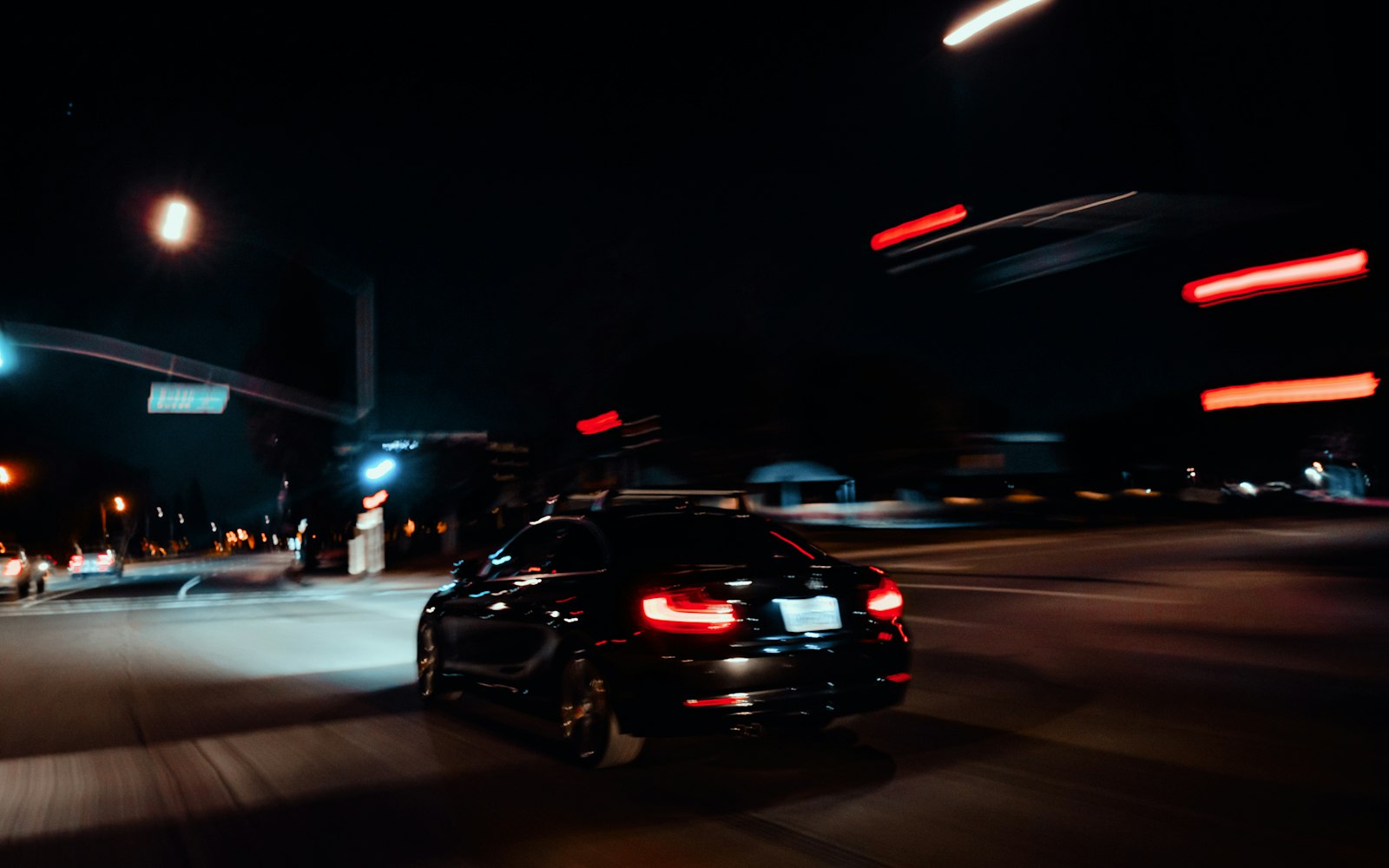 Rideshare car at night, illustrating questions for a rideshare accident lawyer in Rosedale