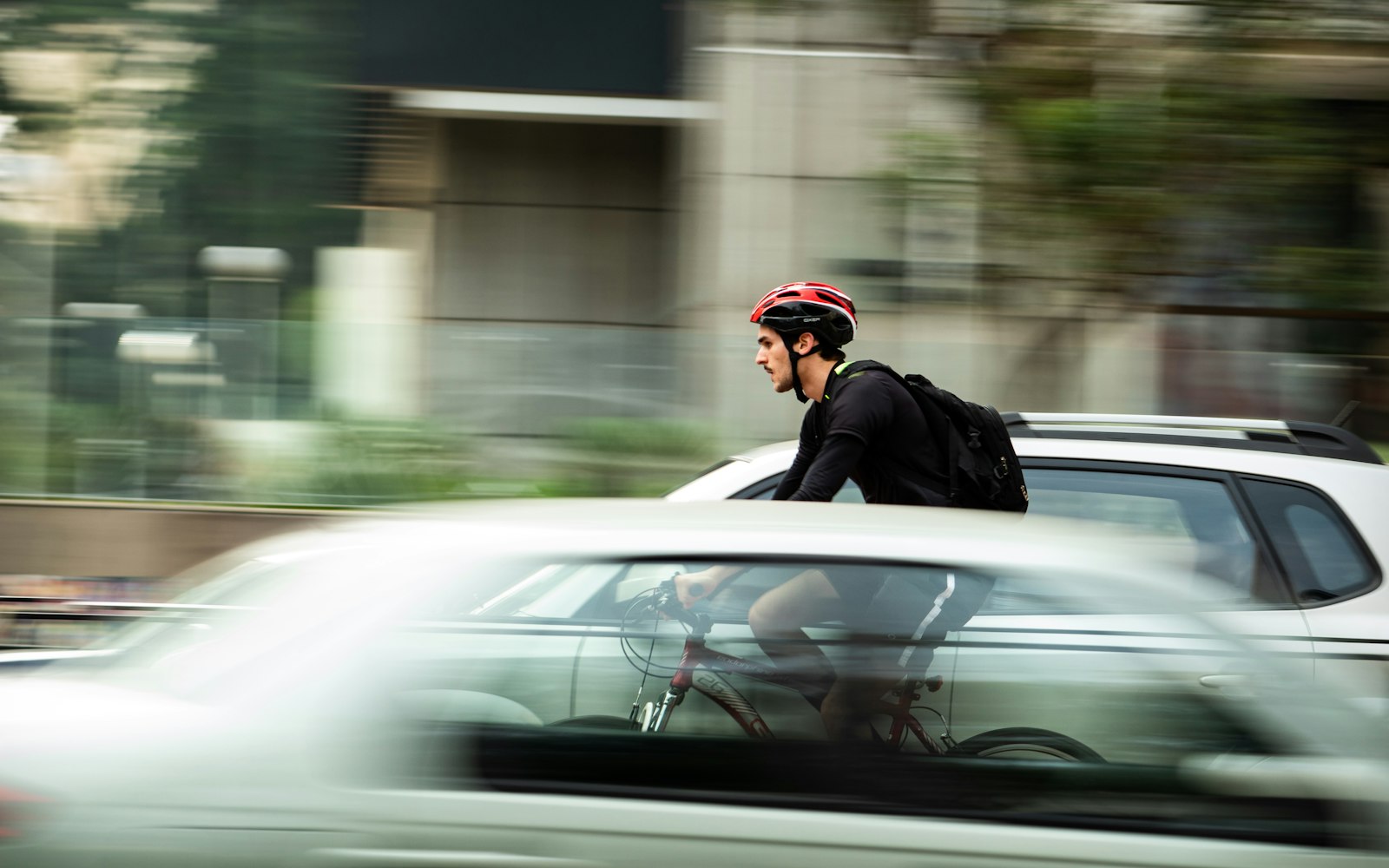 Cyclist riding on a city street, the kind of rider a bicycle accident lawyer in Rosedale represents after a crash