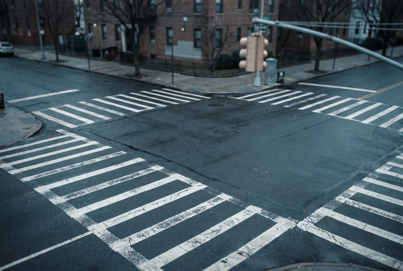 Long Island pedestrian accident lawyer: a painted crosswalk at a busy intersection