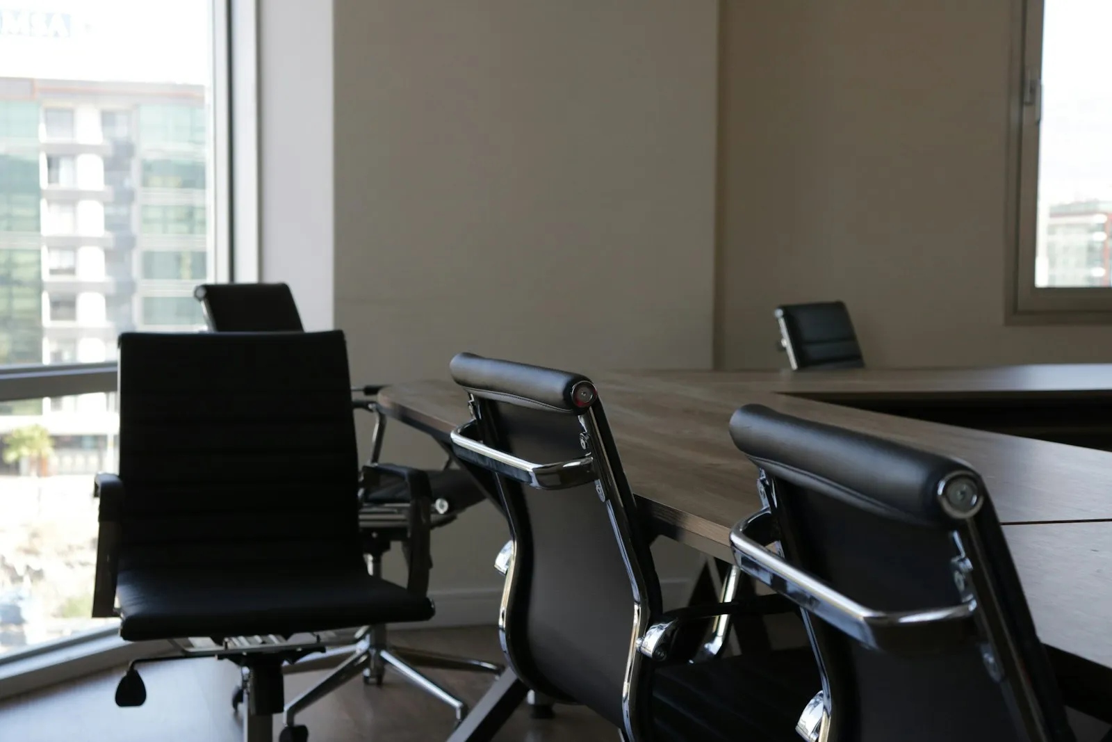 50-h hearing in New York: empty conference room with black office chairs where sworn examinations are held