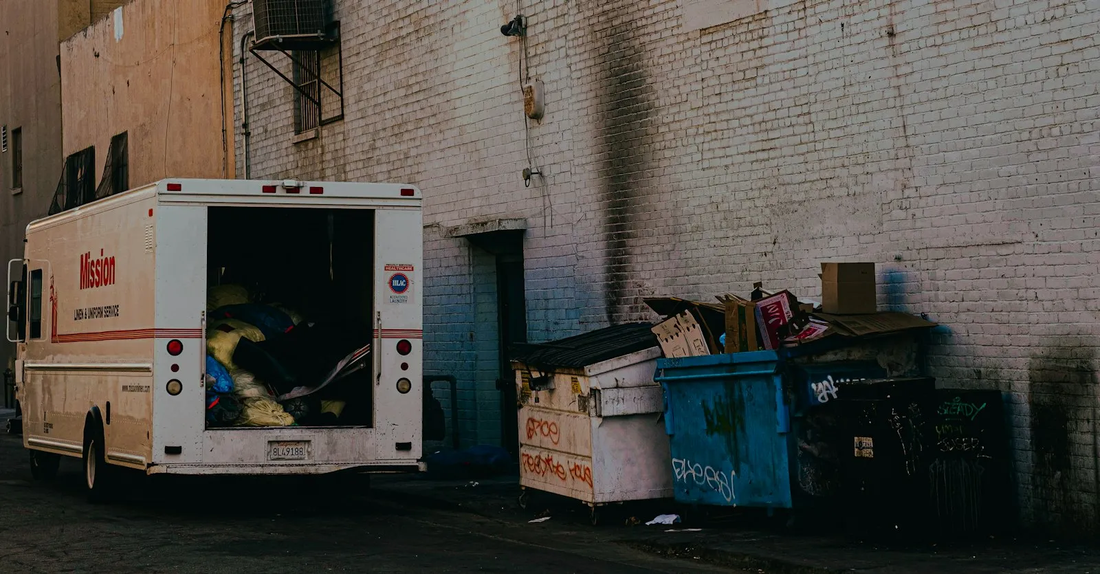Amazon Delivery Truck Accident Lawyer in Bellerose – white van parked beside a building