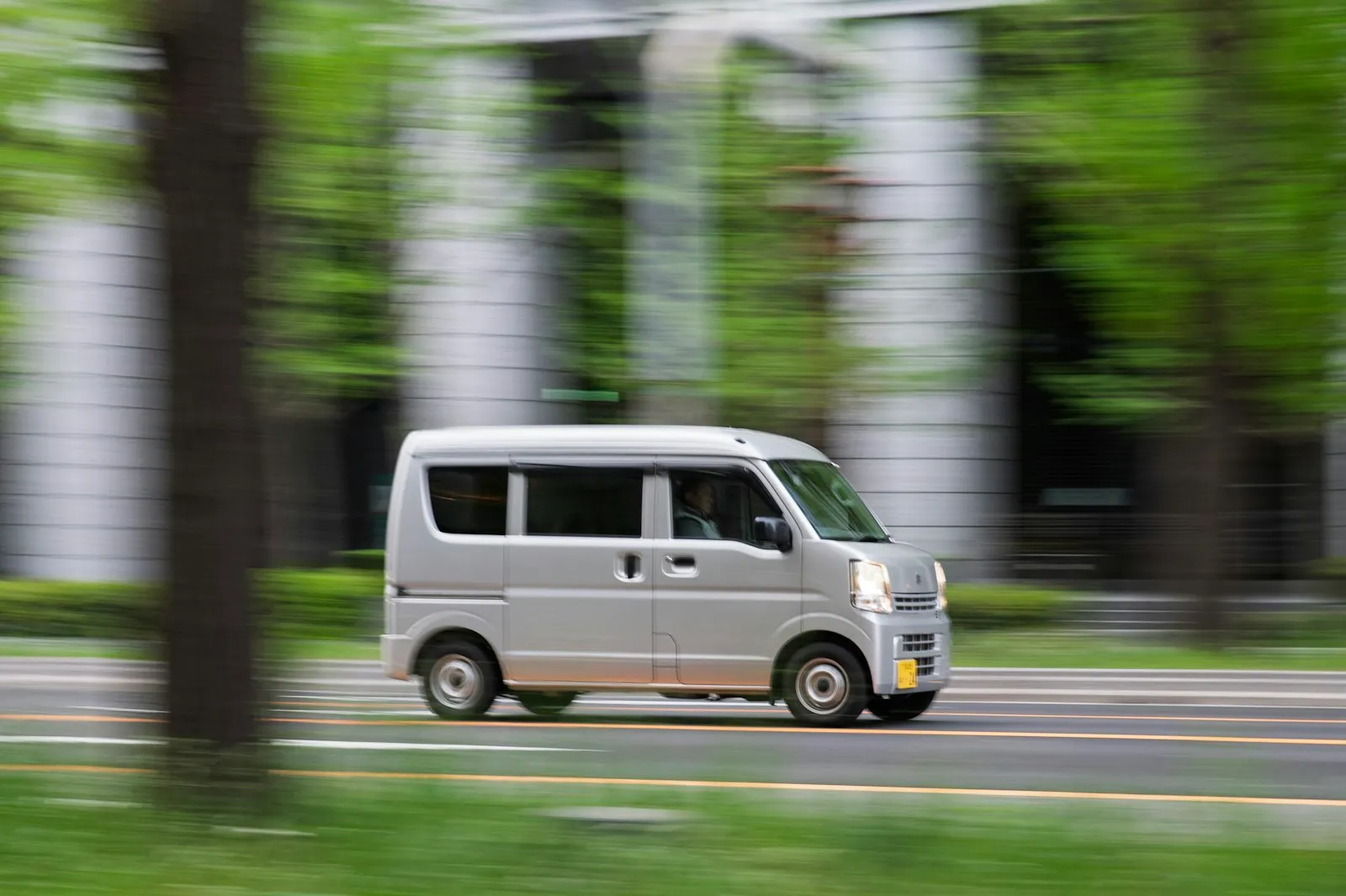 Amazon Delivery Truck Accident Lawyer in Bellerose – silver delivery van driving down a street