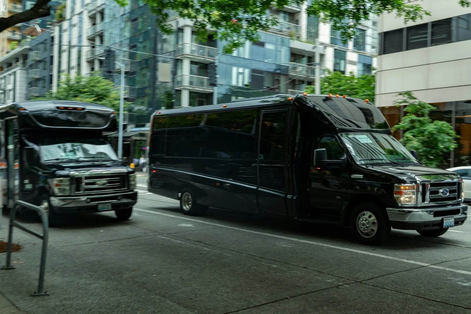 Bus Accident Lawyer in Bellerose – two charter buses driving in traffic