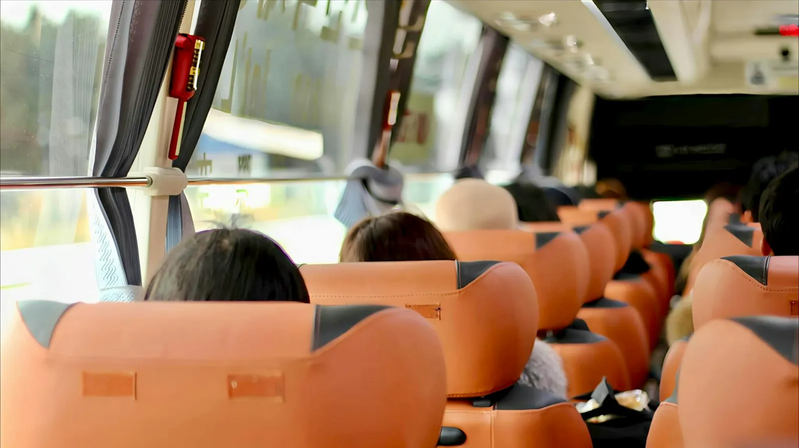 Bus Accident Lawyer in Bellerose – passengers seated inside a coach bus