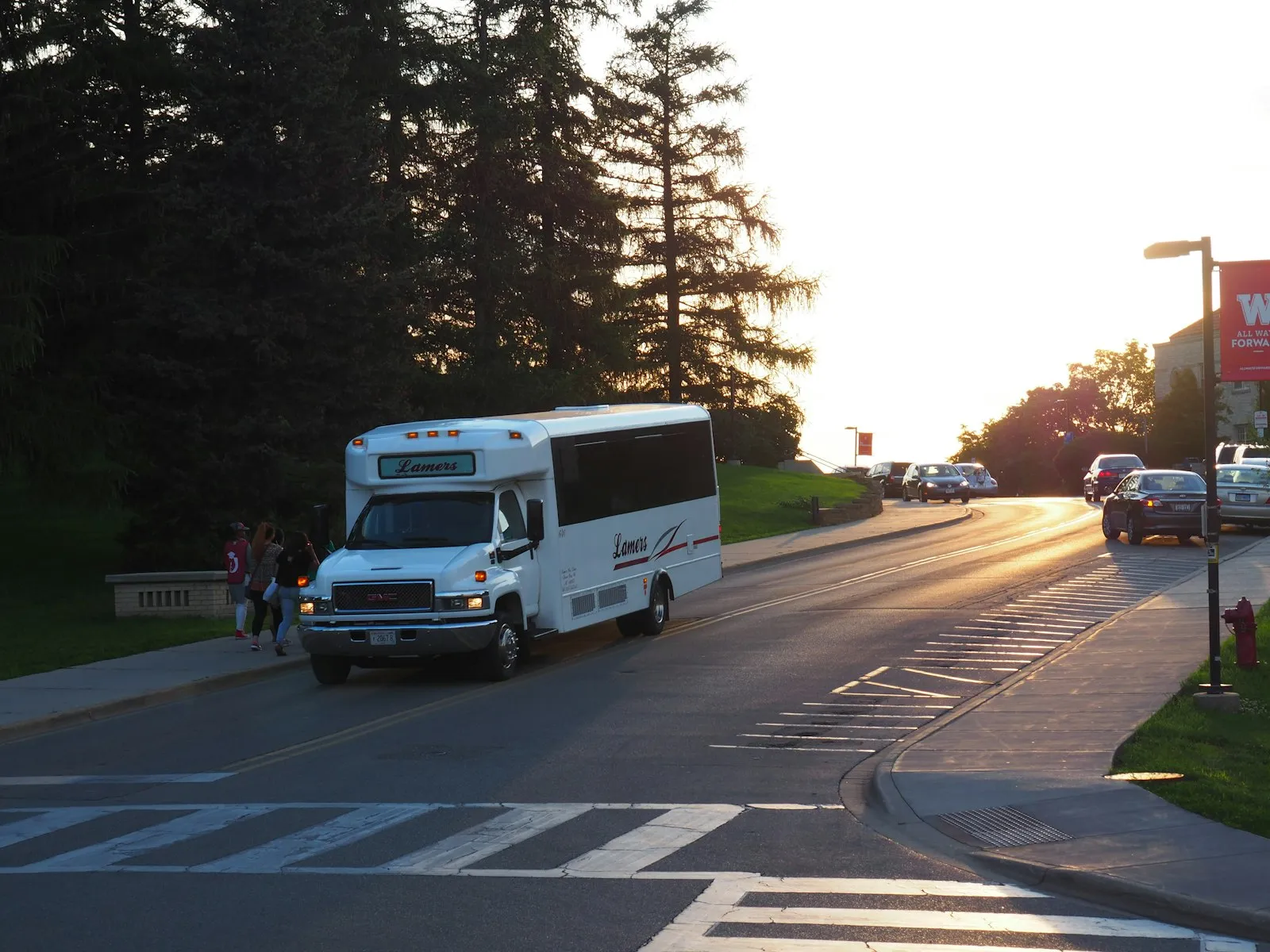 Bus Accident Lawyer in Bellerose – shuttle bus driving on a road