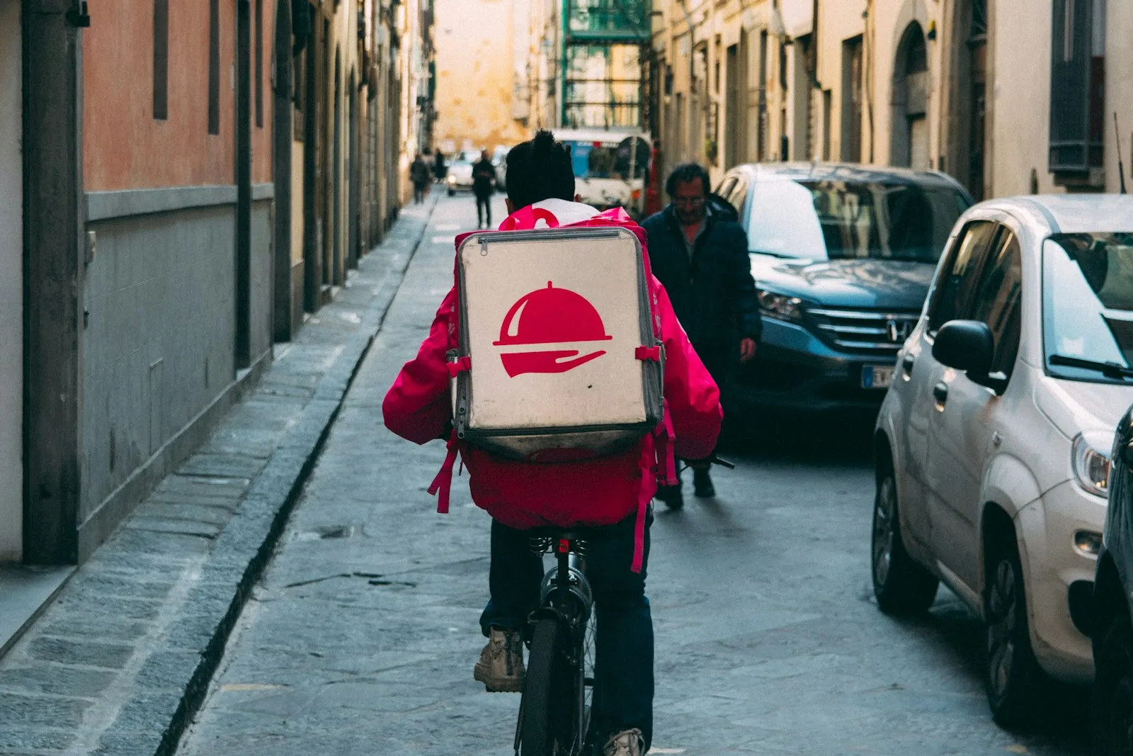 Delivery Driver Accident Lawyer in Bellerose – rider on a bicycle in city traffic