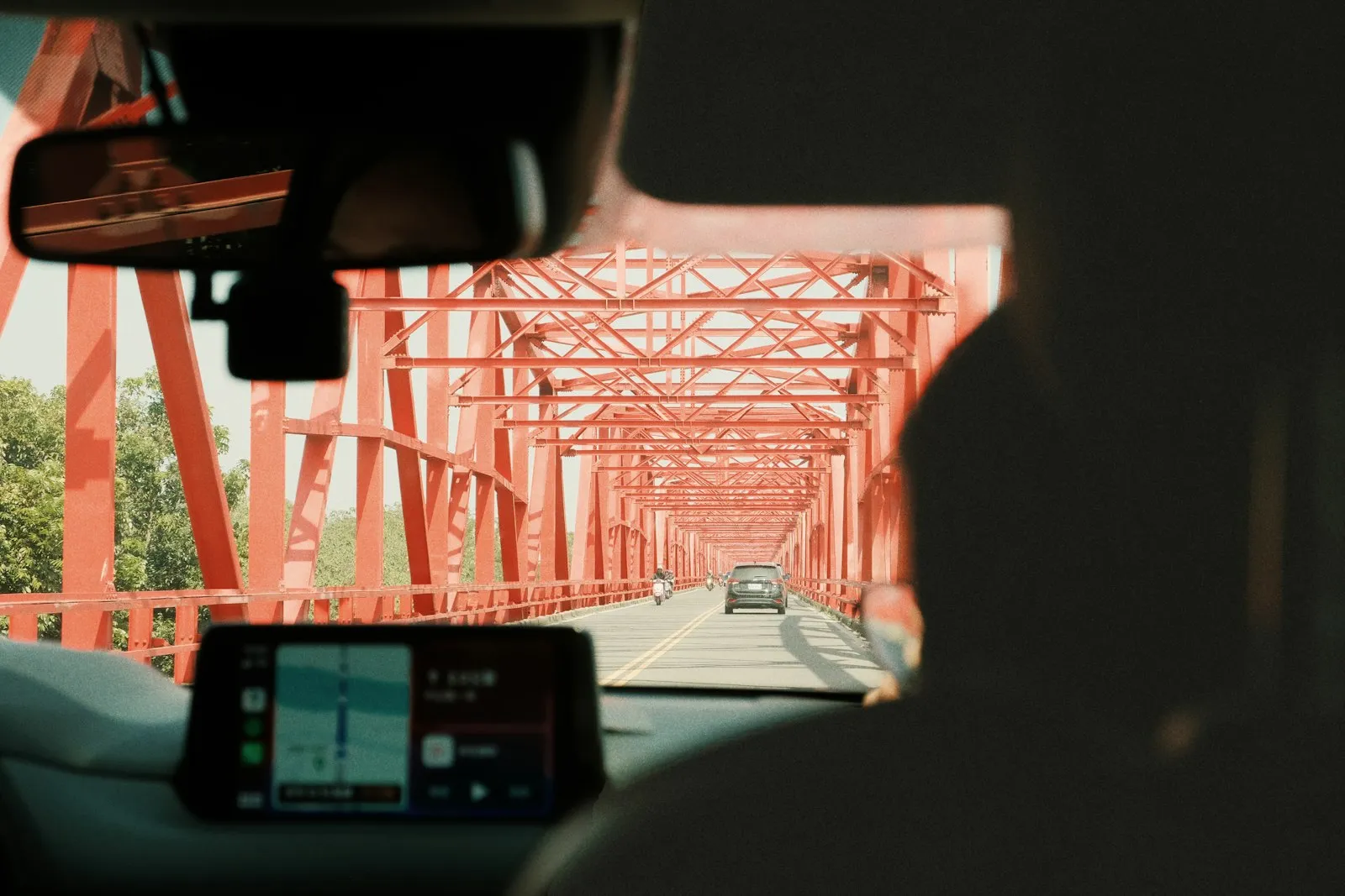 Delivery Truck Accident Lawyer in Bellerose – view of the road from a car dashboard