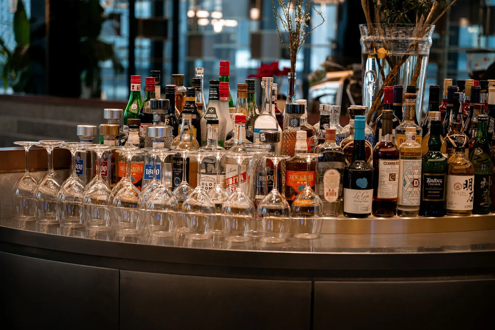 Drunk Driving Accident Lawyer in Bellerose – bar shelves lined with liquor bottles