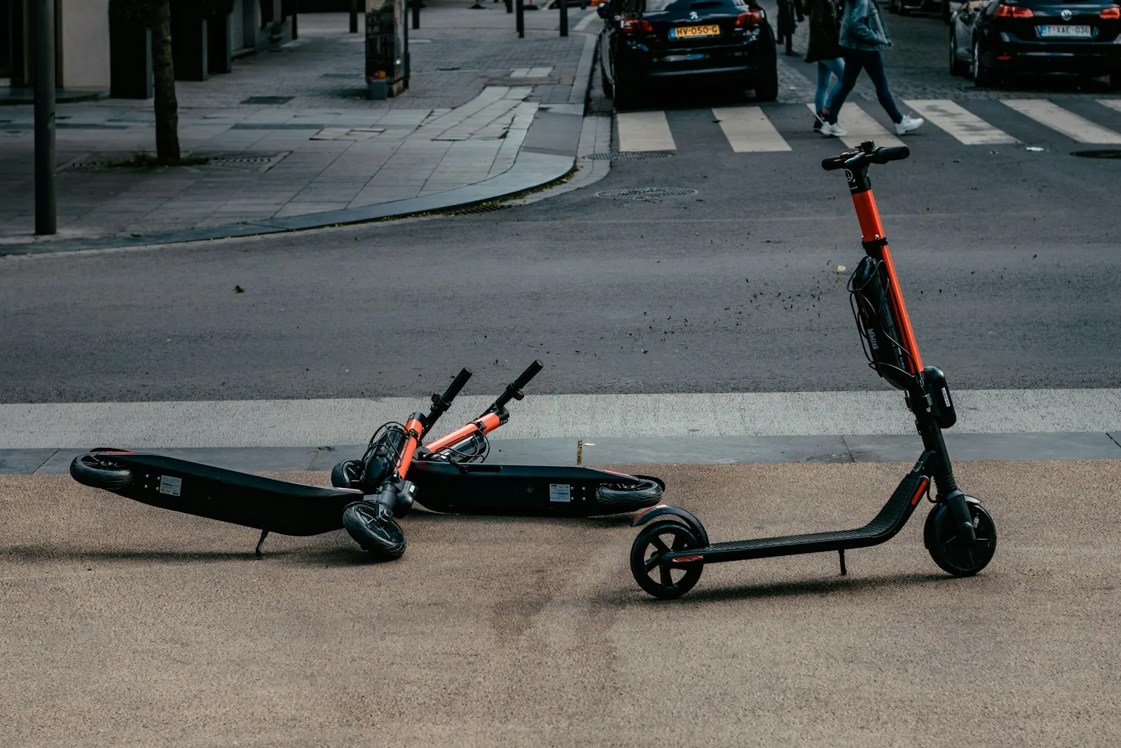 Electric Scooter Accident Lawyer in Bellerose – motorized scooters parked near a road