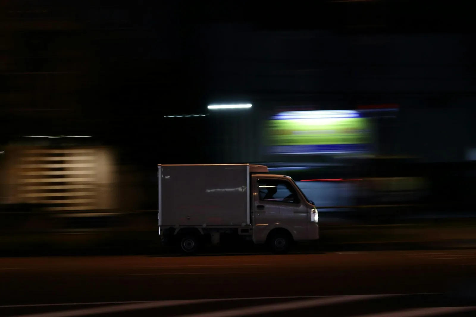 FedEx Truck Accident Lawyer in Bellerose – small white delivery truck on a road