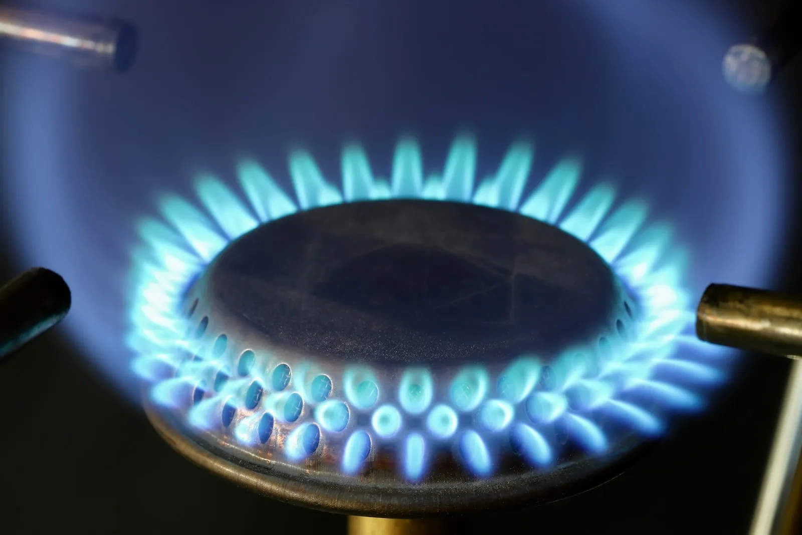 Blue flame on a gas stove burner, an appliance a gas explosion lawyer may have inspected after a leak