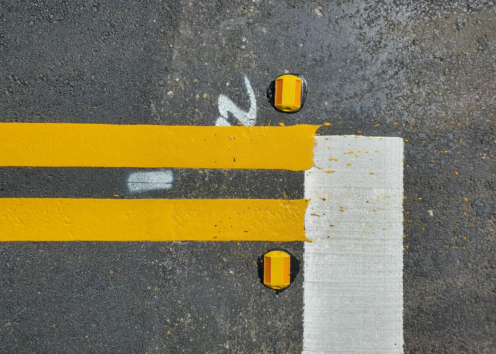Head On Collision Lawyer in Bellerose – yellow center line on a road
