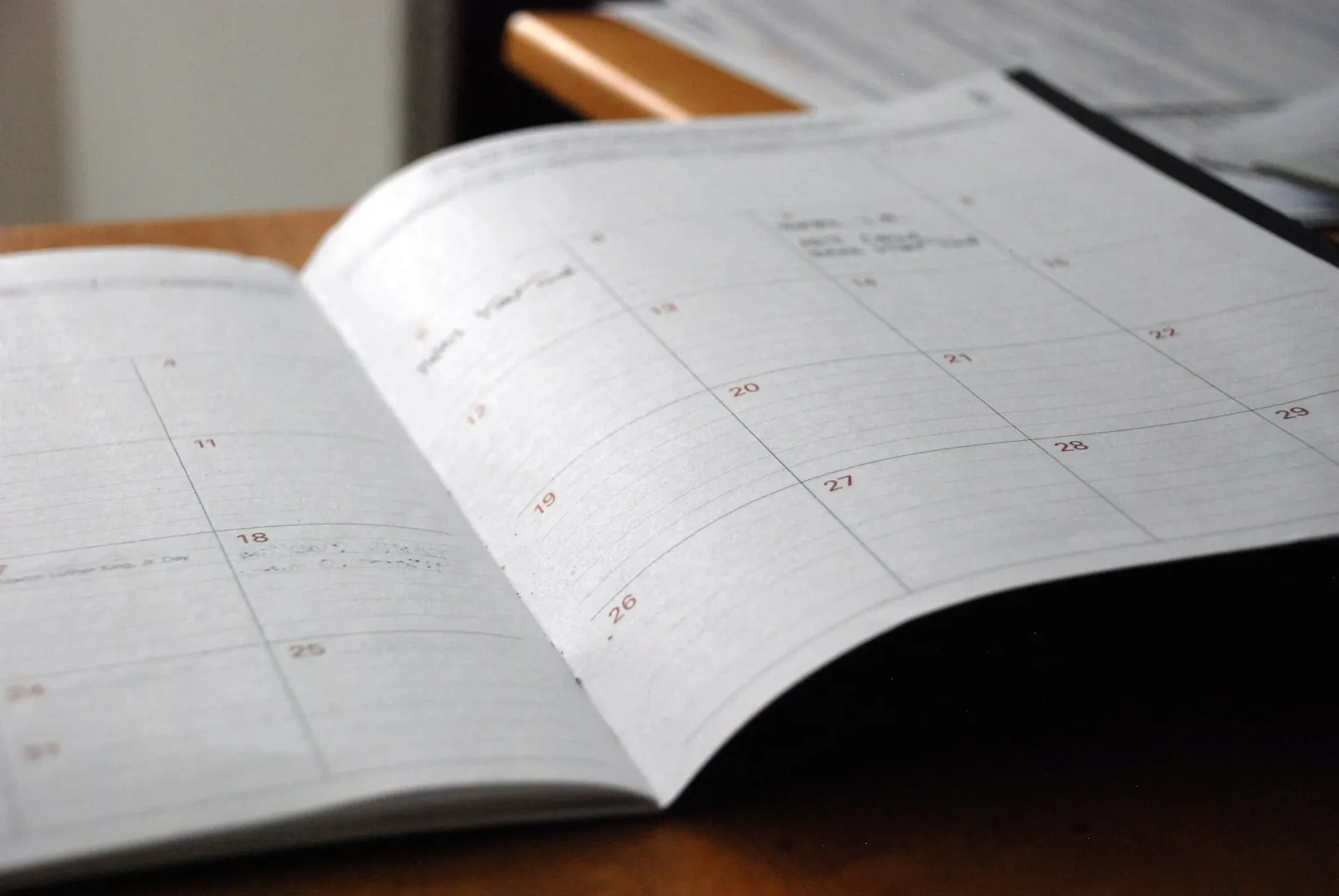 Head On Collision Lawyer in Bellerose – open monthly planner on a desk