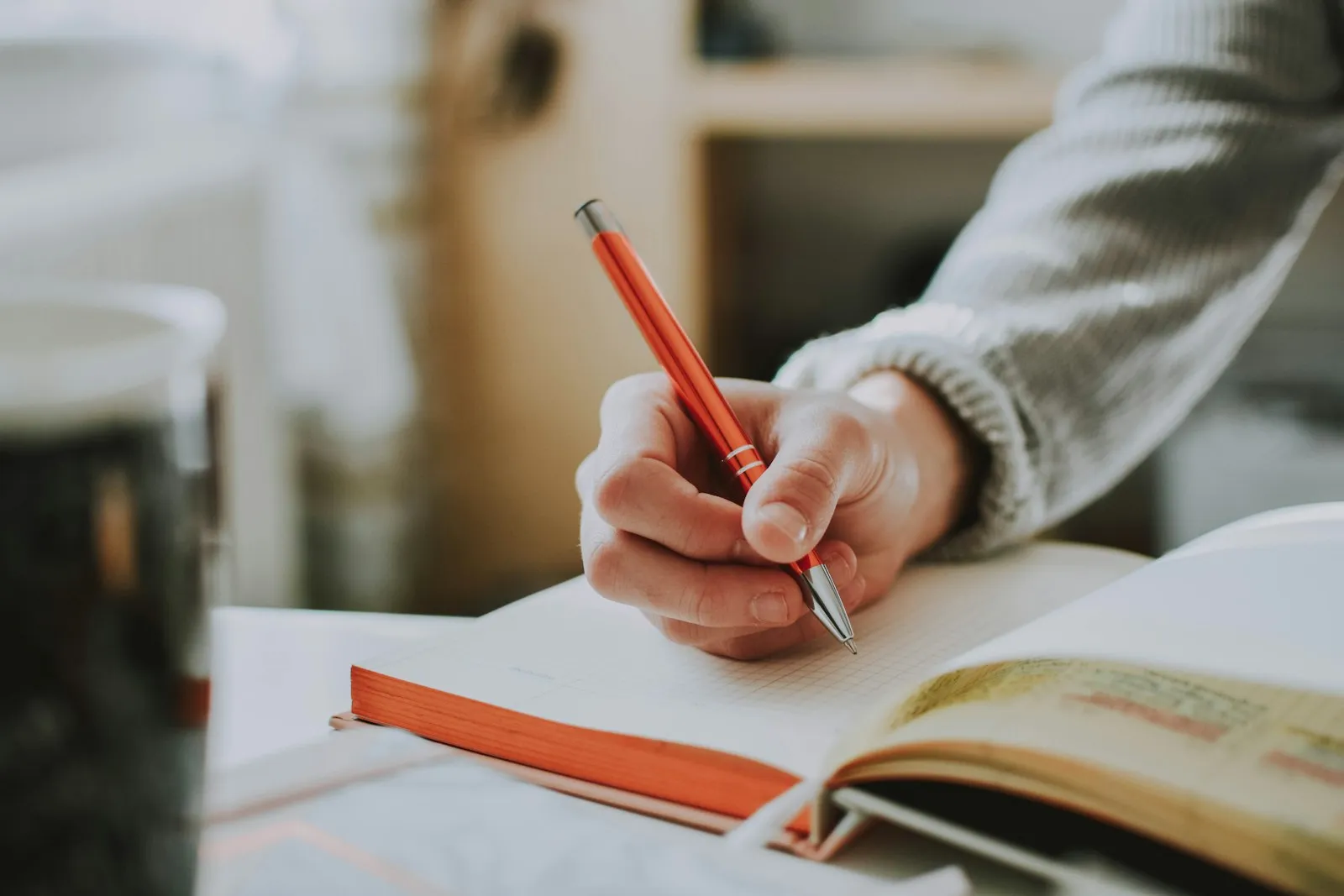 Hit and Run Accident Lawyer in Bellerose – writing down notes after a crash