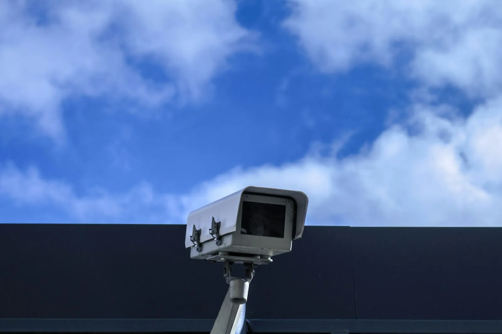 Hit and Run Accident Lawyer in Bellerose – security camera mounted on a building