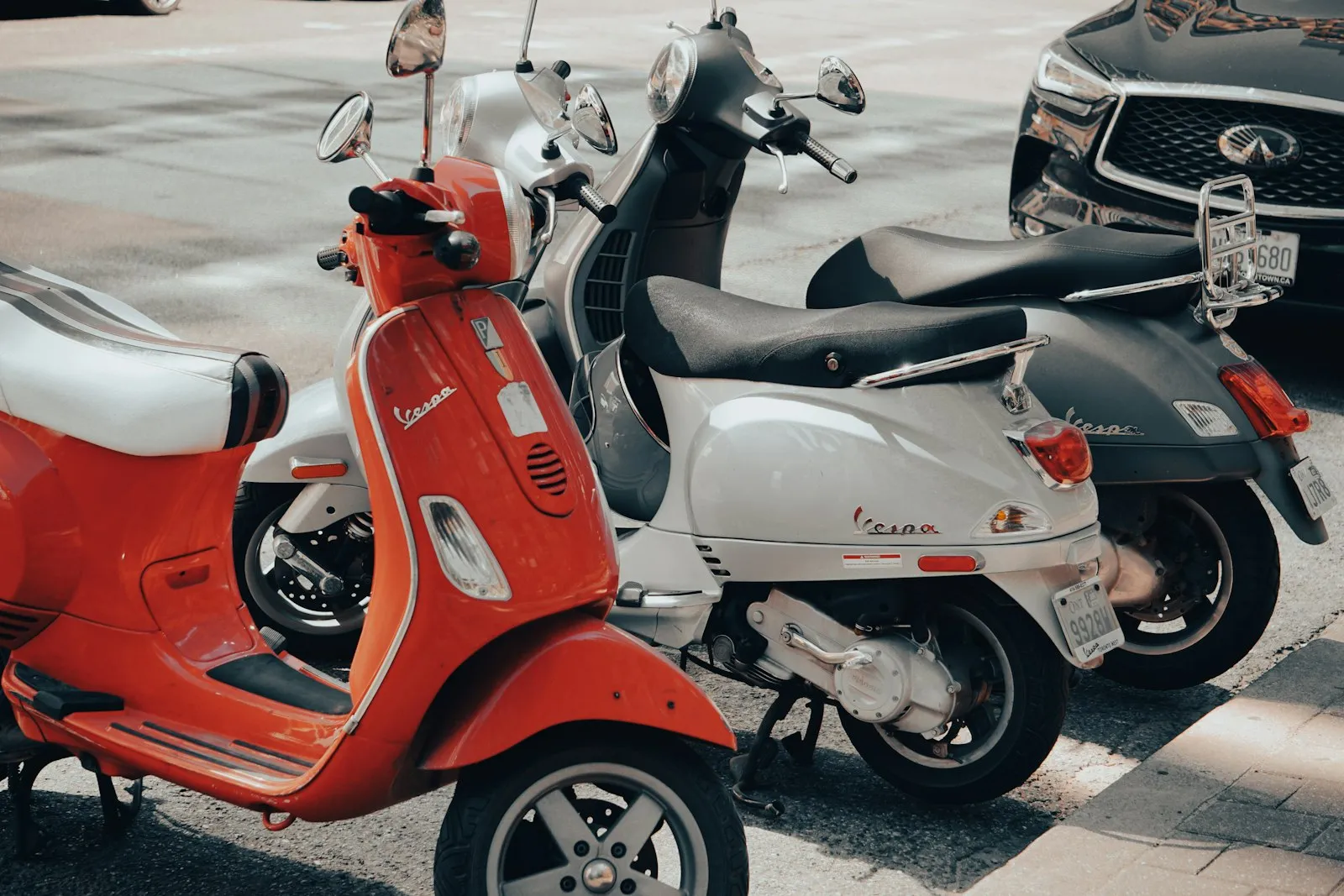 Moped Accident Lawyer in Bellerose – red and white moped parked outside