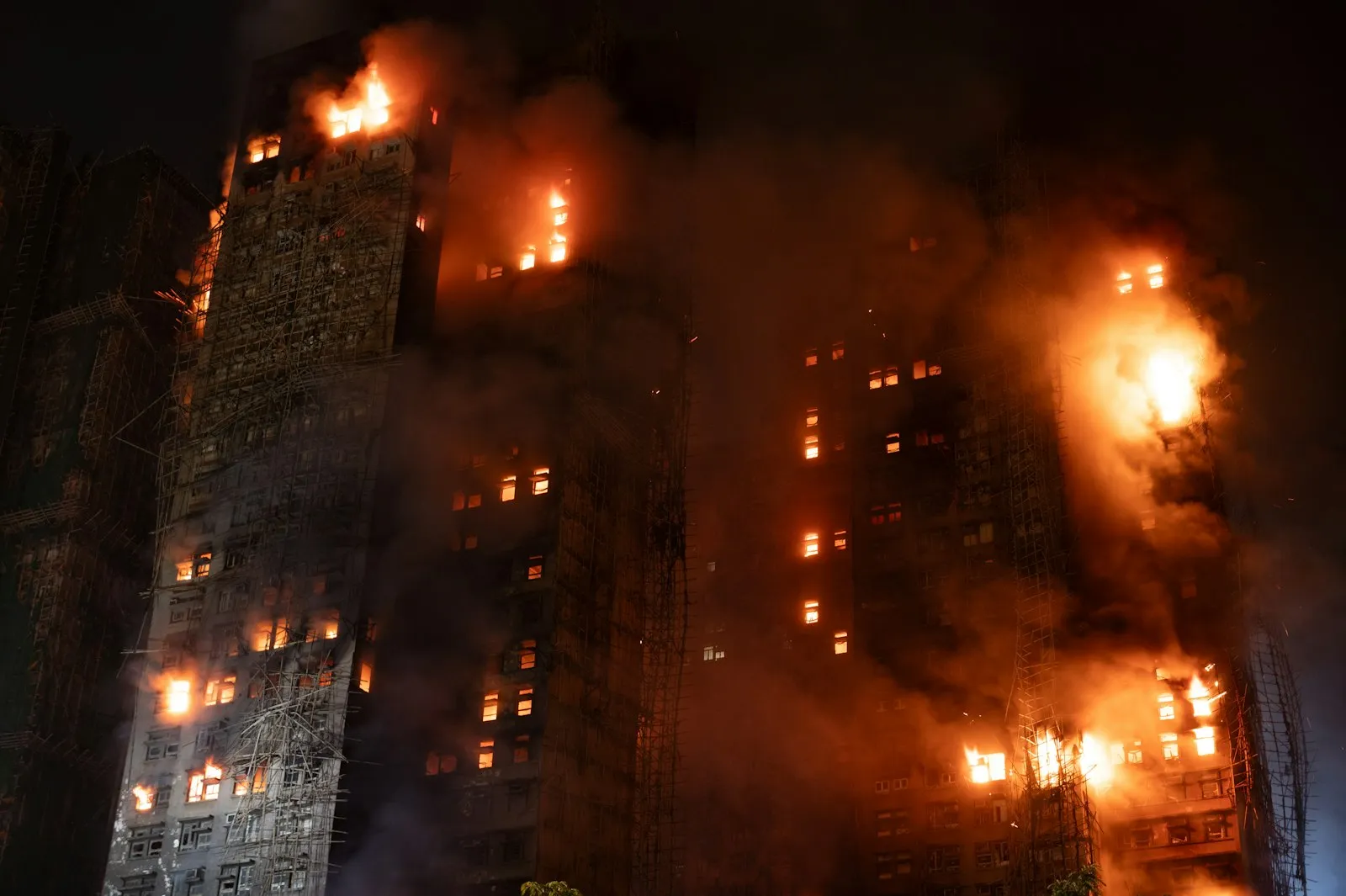 NYC burn injury lawyer: high-rise apartment building on fire at night