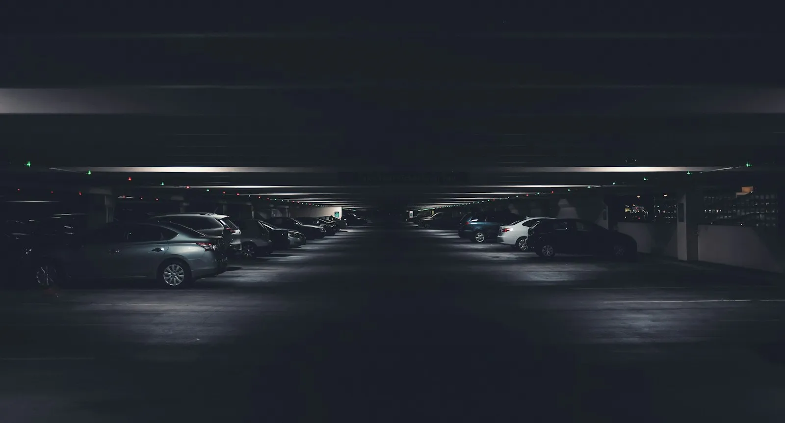 Parking Garage Accident Lawyer in Bellerose – rows of parked cars inside a garage