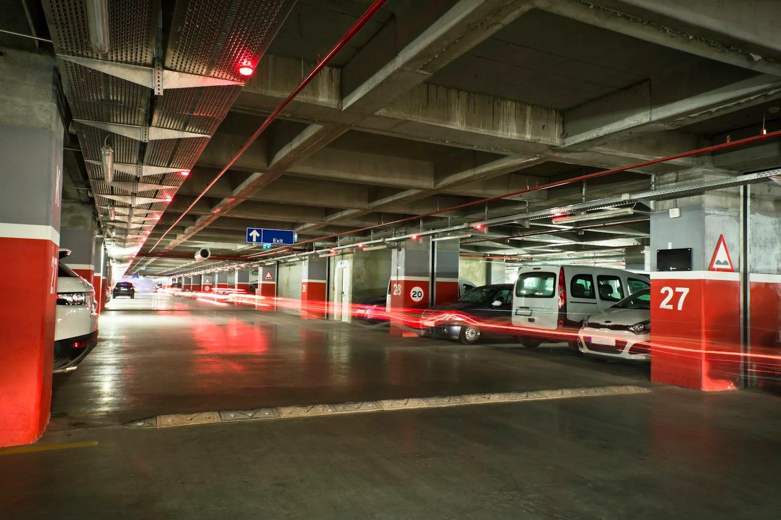 Parking Garage Accident Lawyer in Bellerose – cars parked in a dimly lit garage