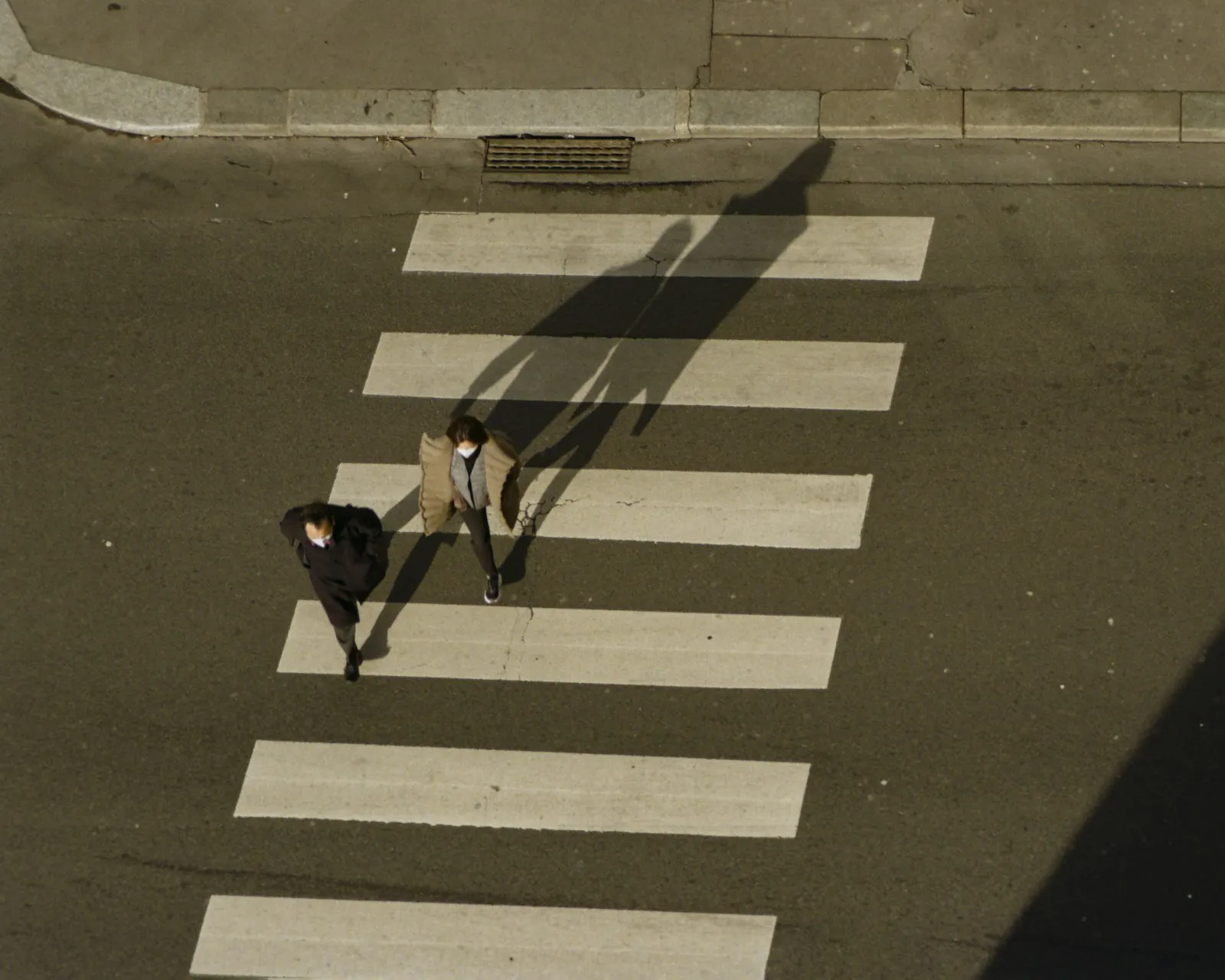 Pedestrian Accident Lawyer in Bellerose – pedestrians crossing at a striped crosswalk