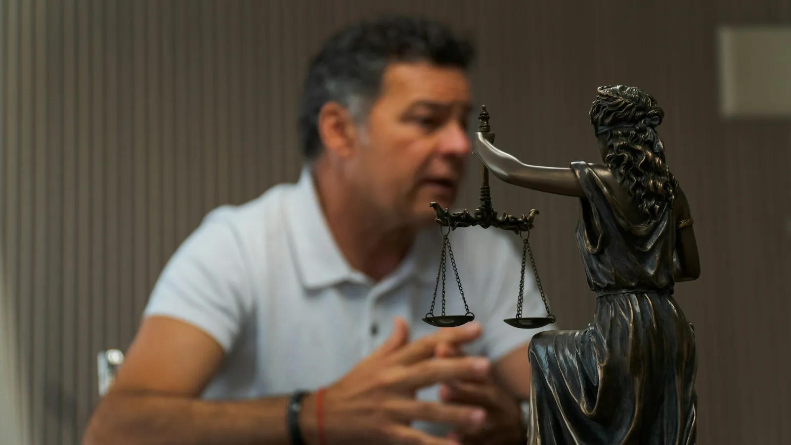 Personal Injury Lawyer in Bellerose – man reviewing documents at a table