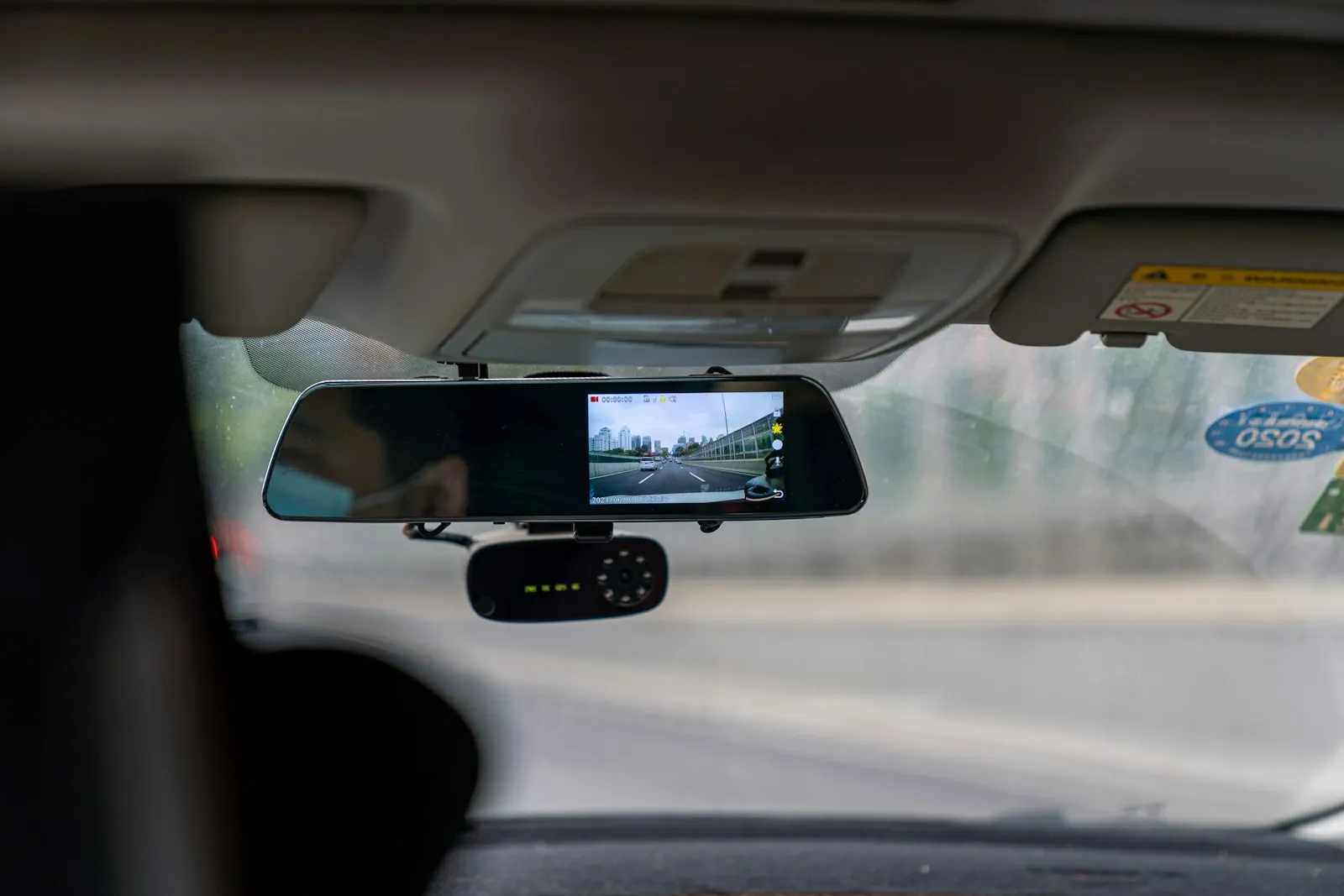 Car side mirror with raindrops