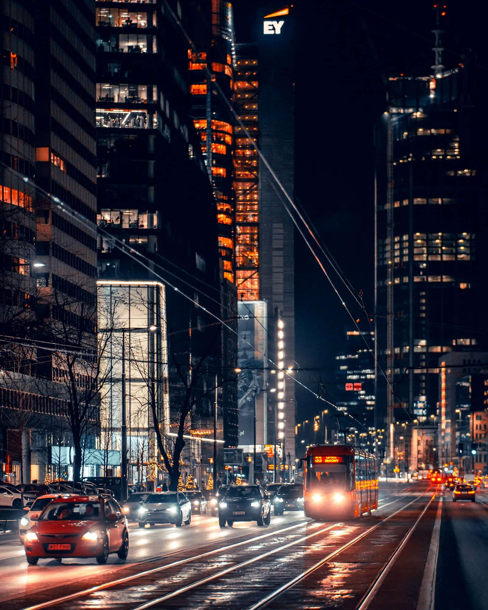 City street filled with traffic at night