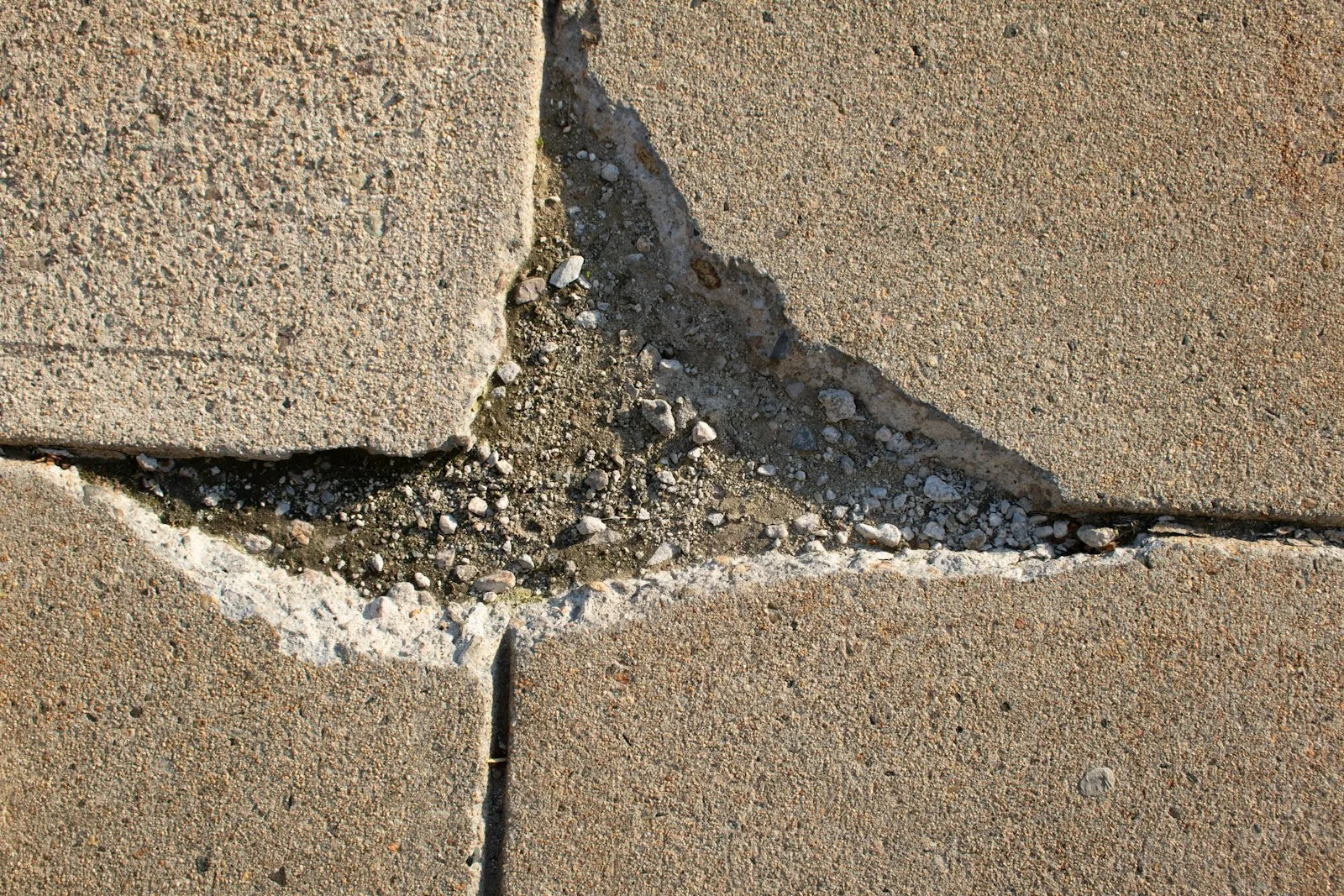 Crack running through a concrete surface