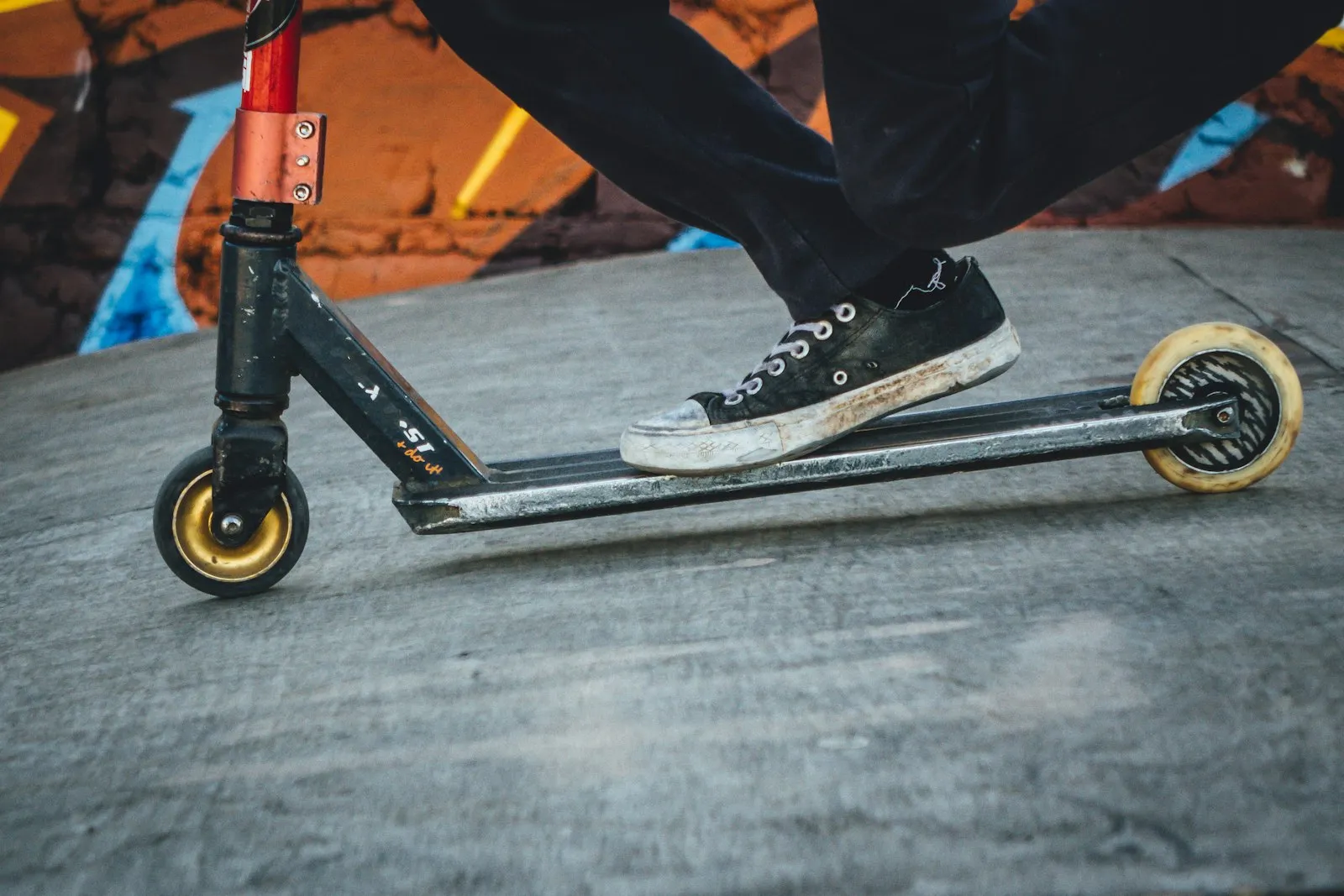 Scooter Accident Lawyer in Bellerose – person riding a scooter on a city street