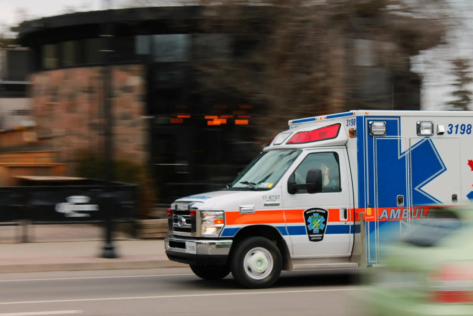 Truck Accident Lawyer in Bellerose – ambulance responding to a crash