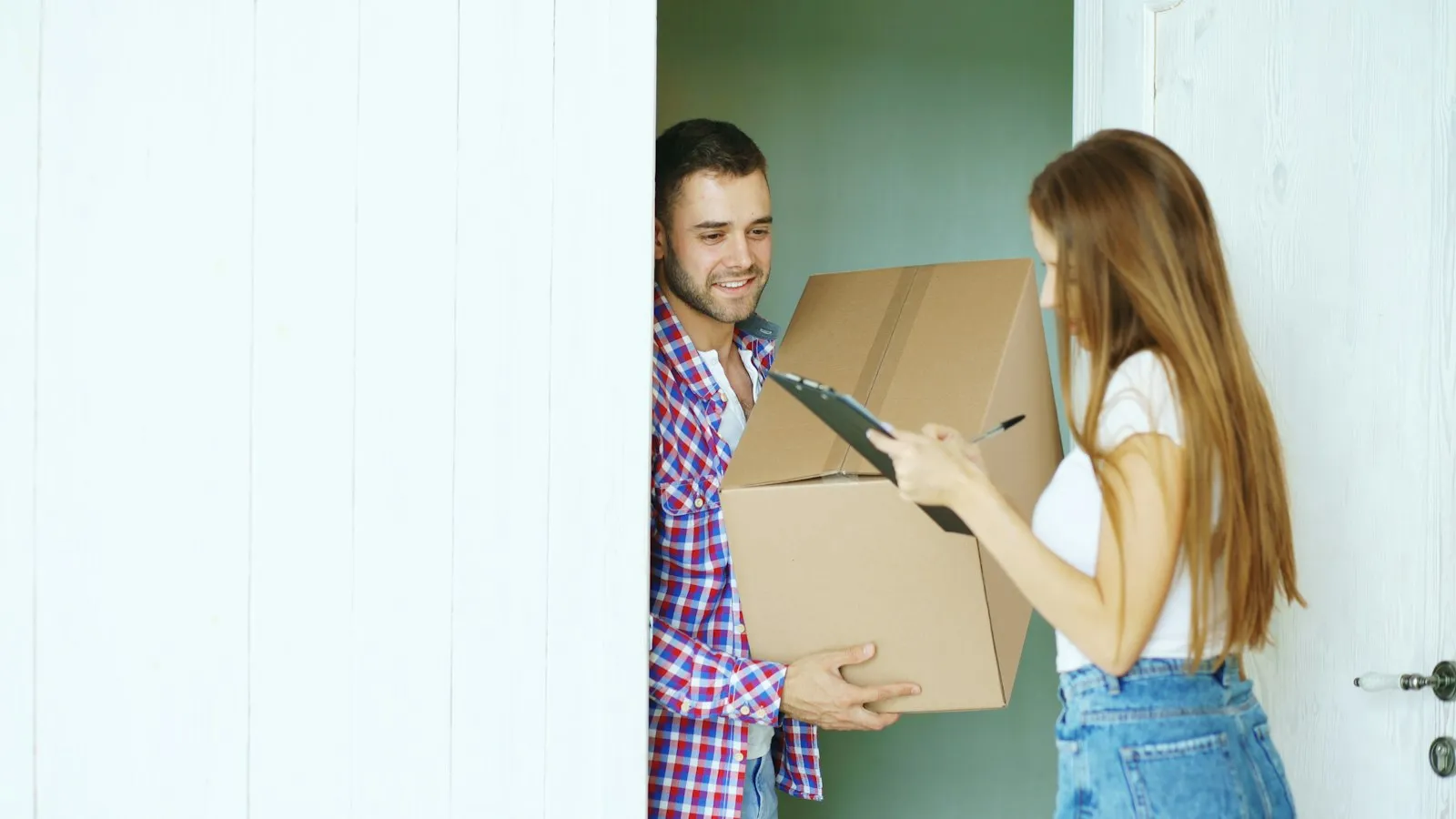 UPS Truck Accident Lawyer in Bellerose – package being handed off at a front door