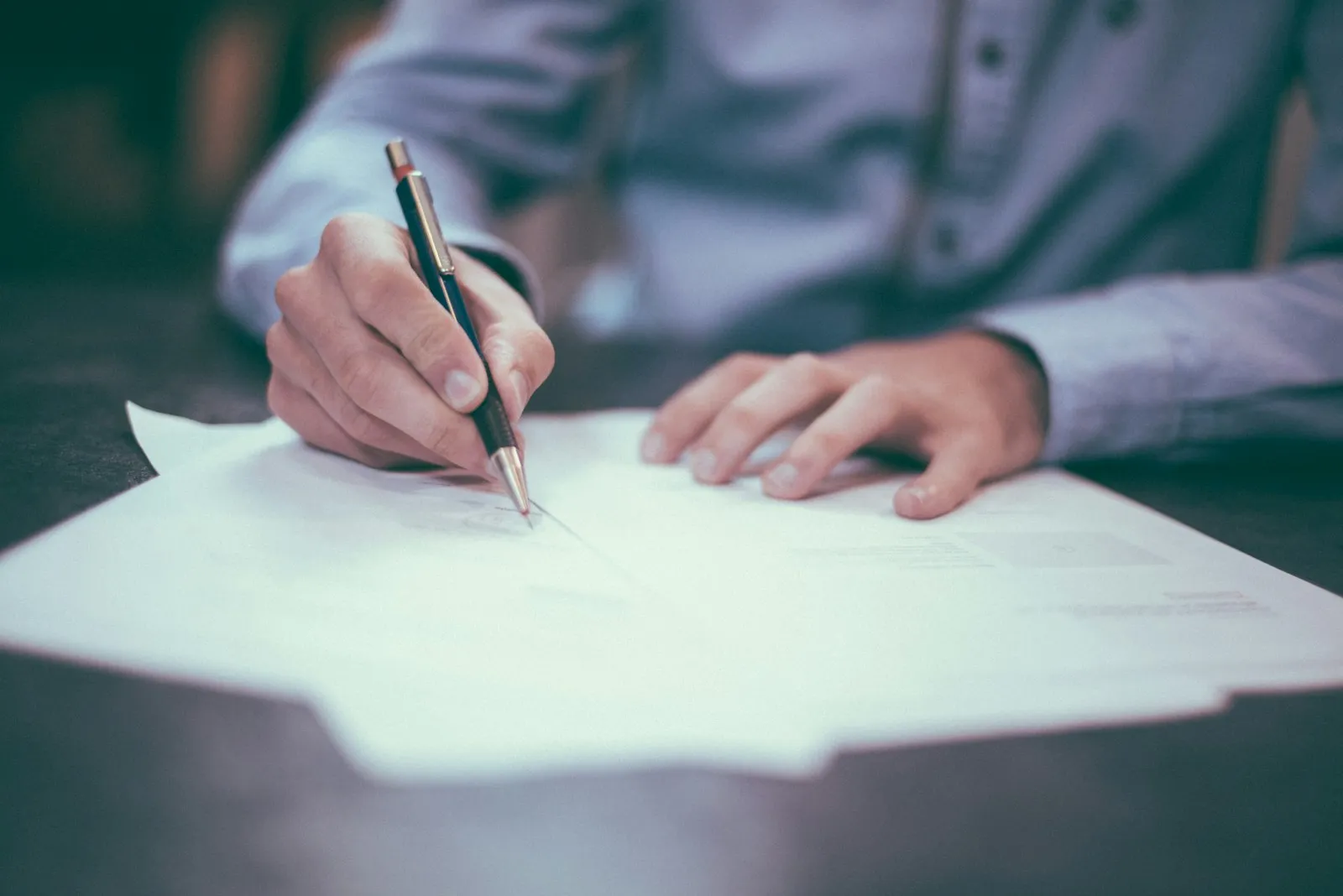 UPS Truck Accident Lawyer in Bellerose – man writing notes on paper