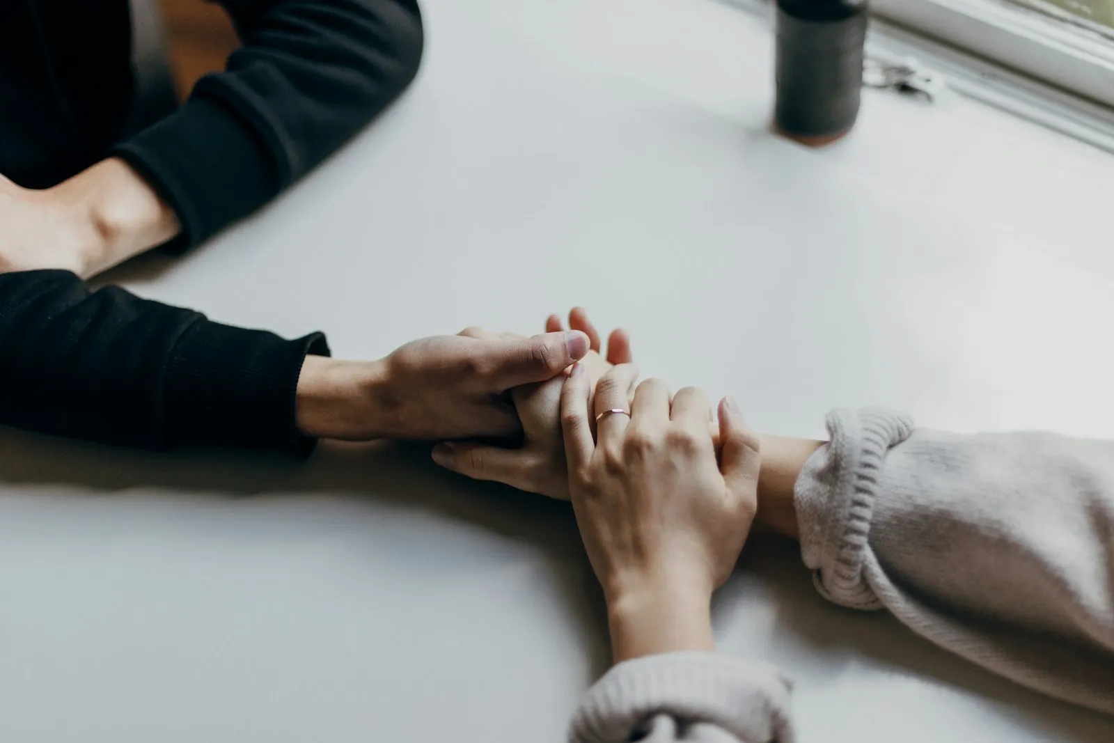 Wrongful Death Lawyer in Bellerose – two people holding hands