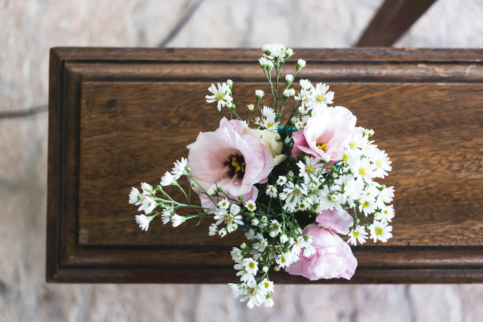 Wrongful Death Lawyer in Bellerose – pink and white memorial flowers